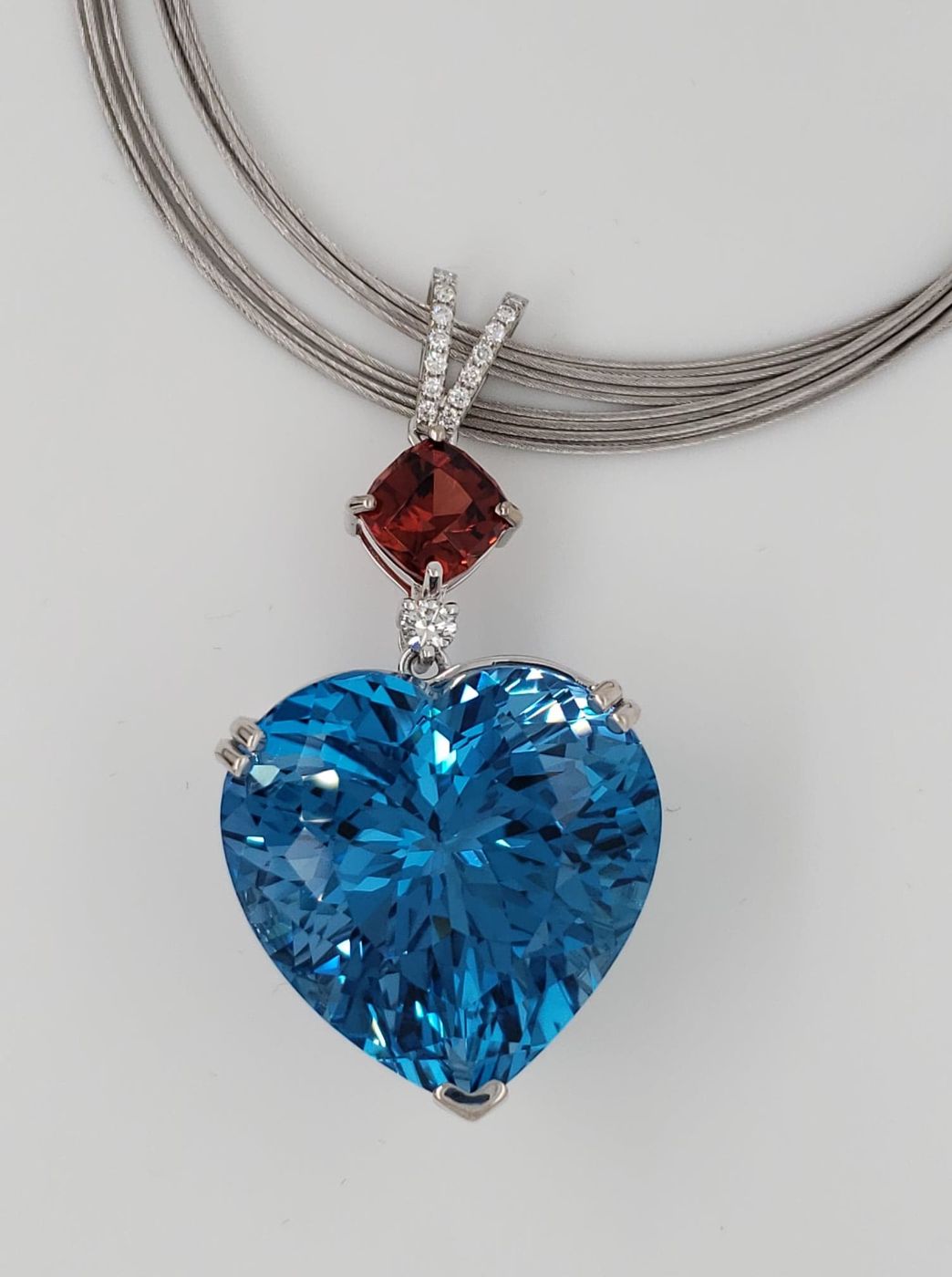 80ct London Blue Topaz and 3.5ct Malaya Imperial Garnet and Diamond Pendant