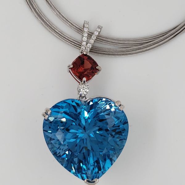 80ct London Blue Topaz and 3.5ct Malaya Imperial Garnet and Diamond Pendant