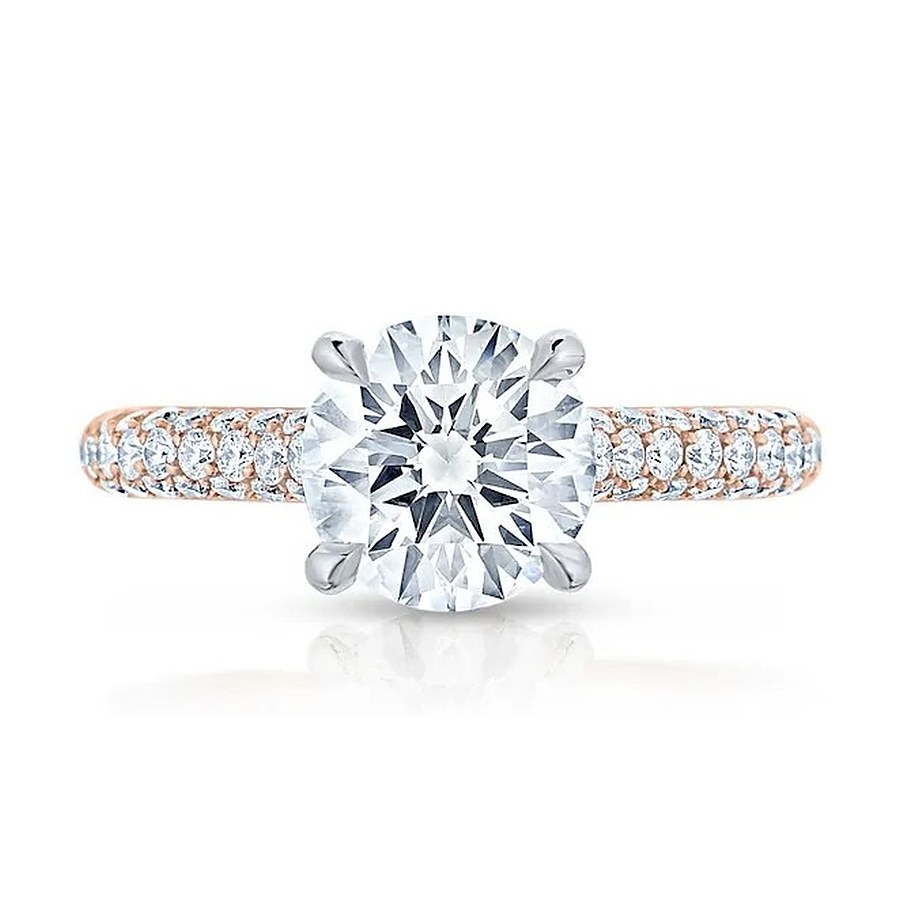 Round brilliant diamond engagement ring with a pavé-set band in rose gold