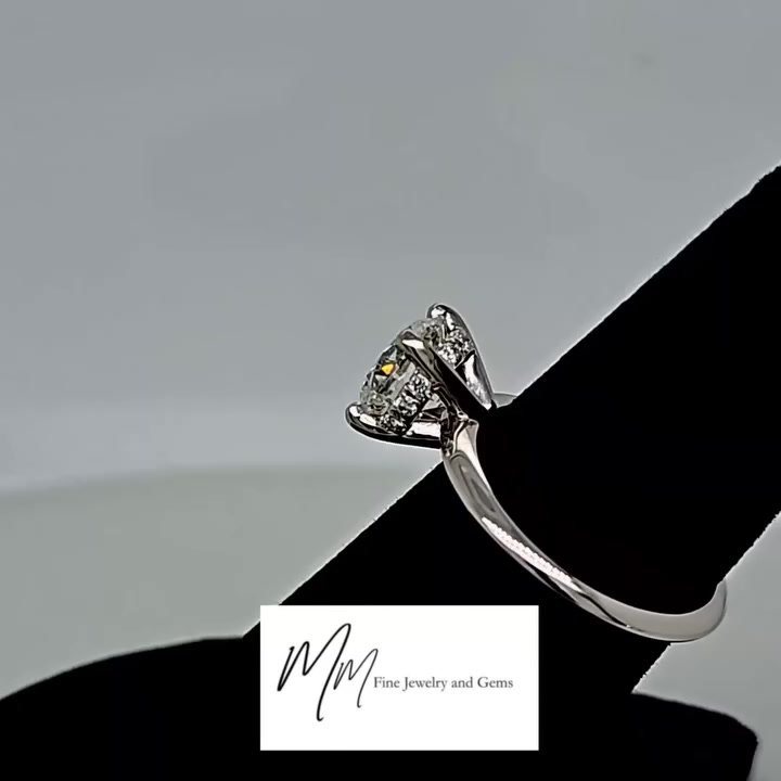 2 carat Hearts on Fire round diamond solitaire in platinum with a hidden halo